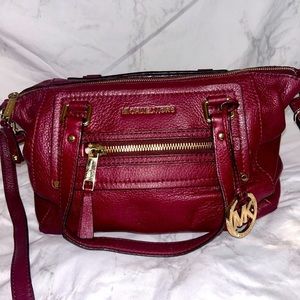 Women’s Michael Kors preowned medium size purse wine color